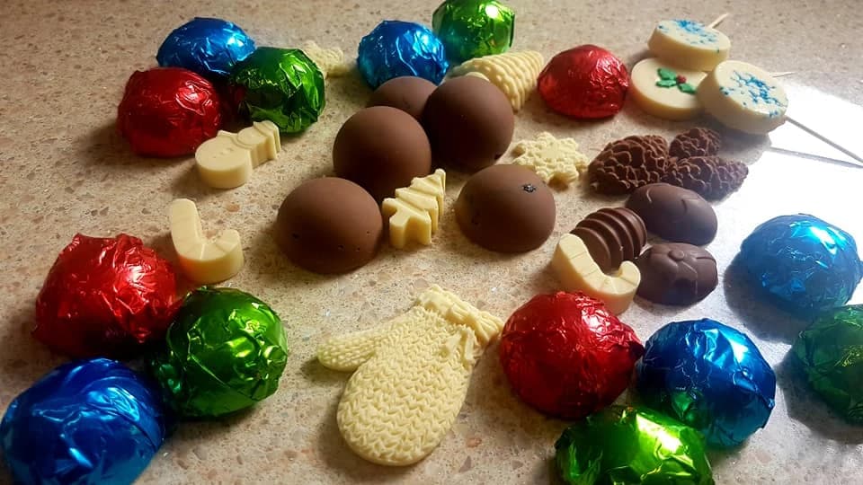 Prunes with nuts in chocolate